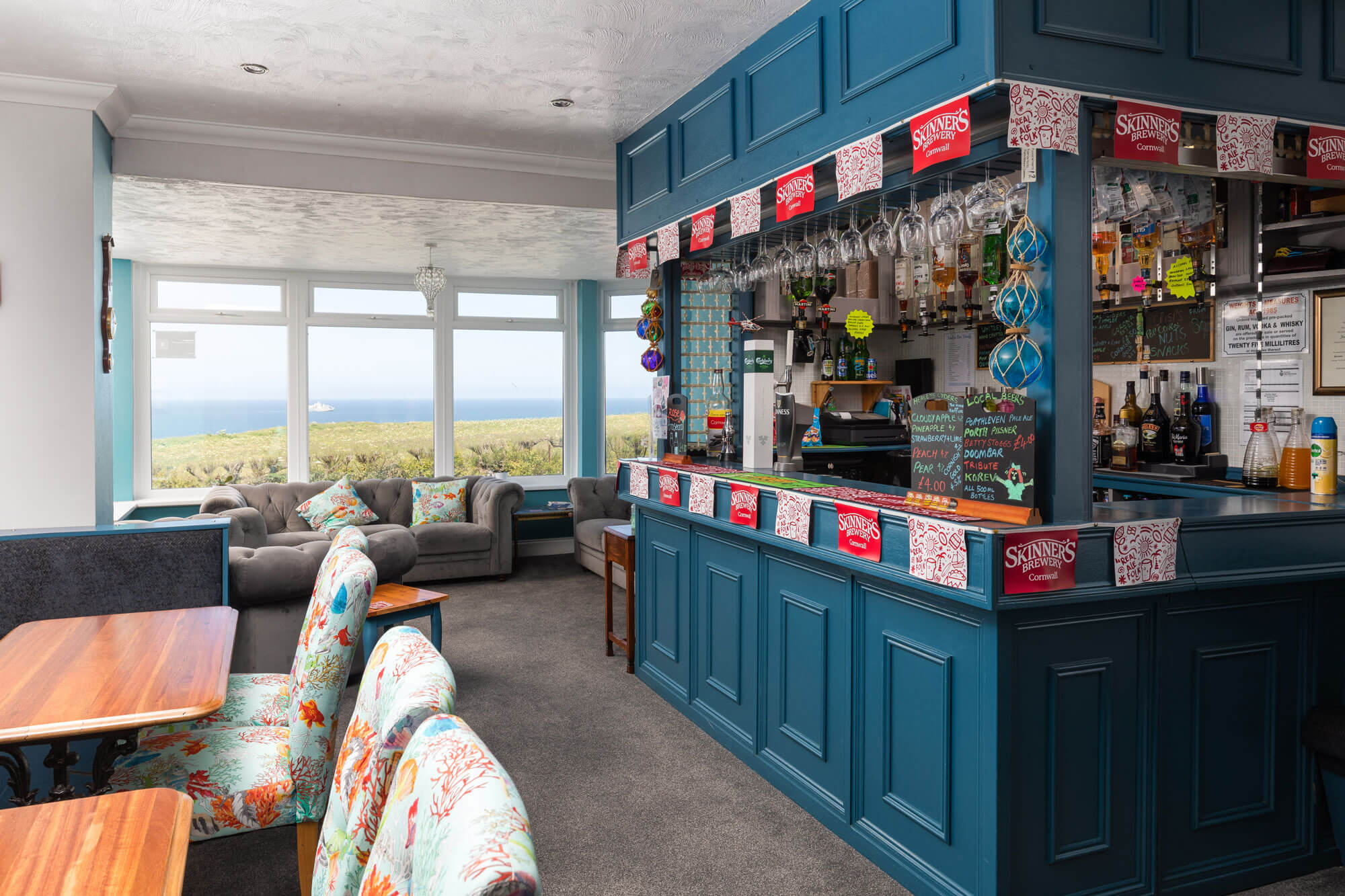 A comfy bar area with views over the ocean