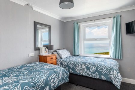 http://A%20twin%20bed%20room%20with%20sea%20views%20over%20the%20Cornish%20coast%20line